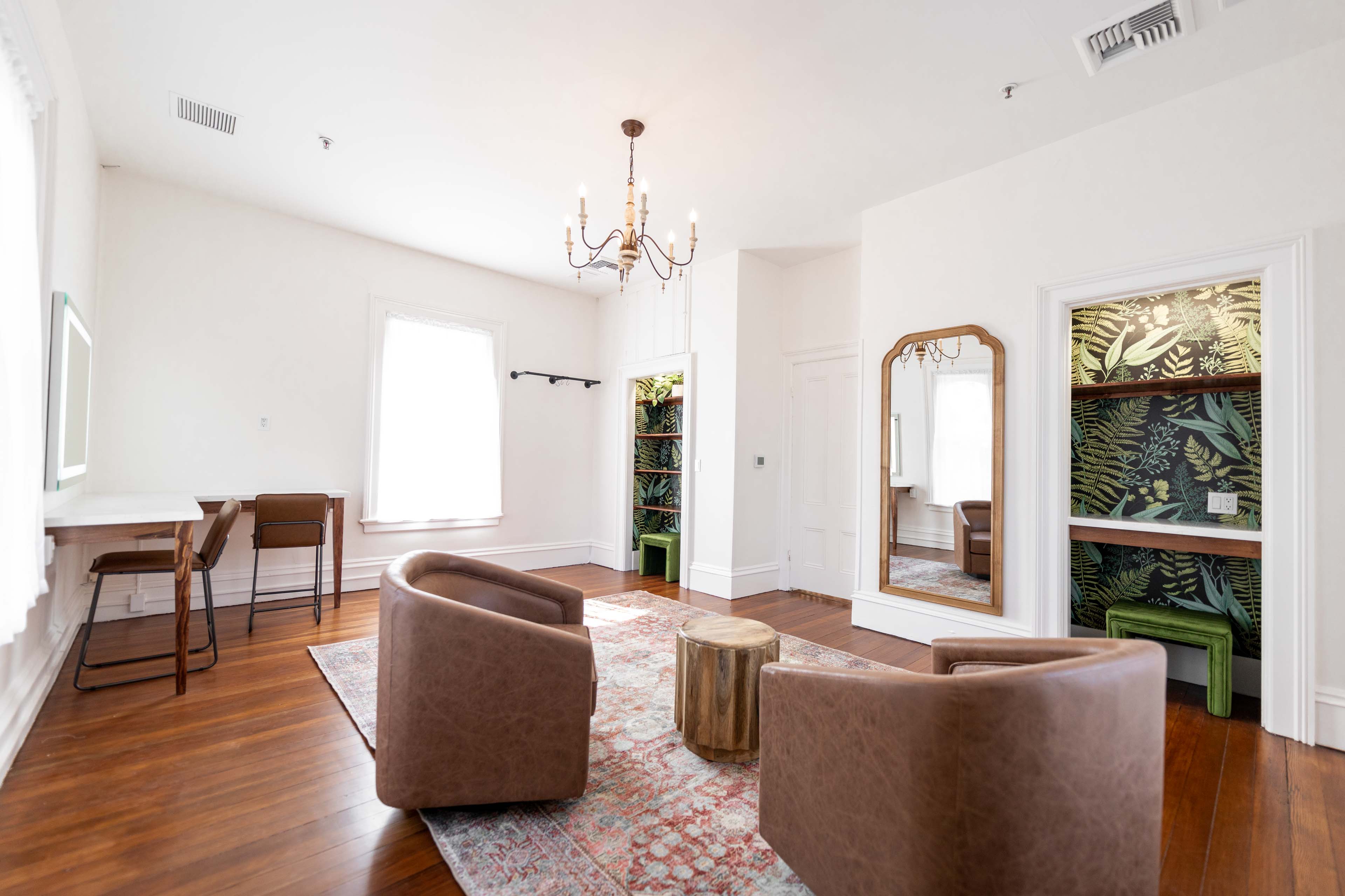 couches and mirror on the bridal suite