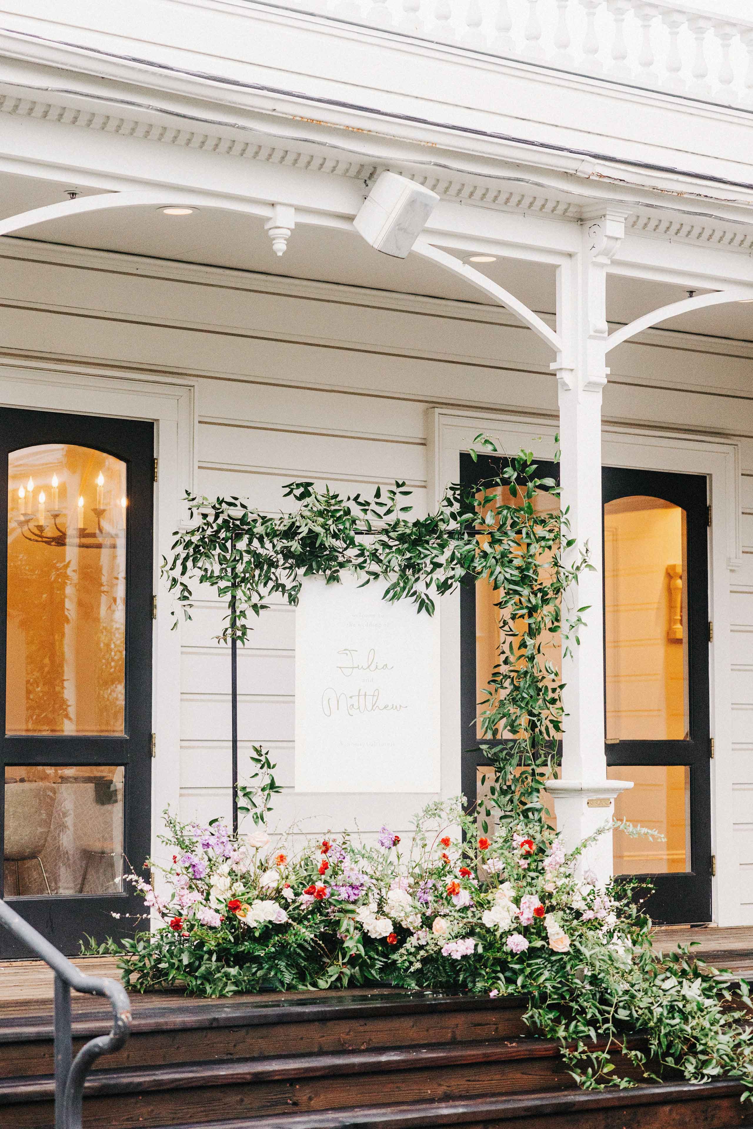Floral decorations on side porch stairs