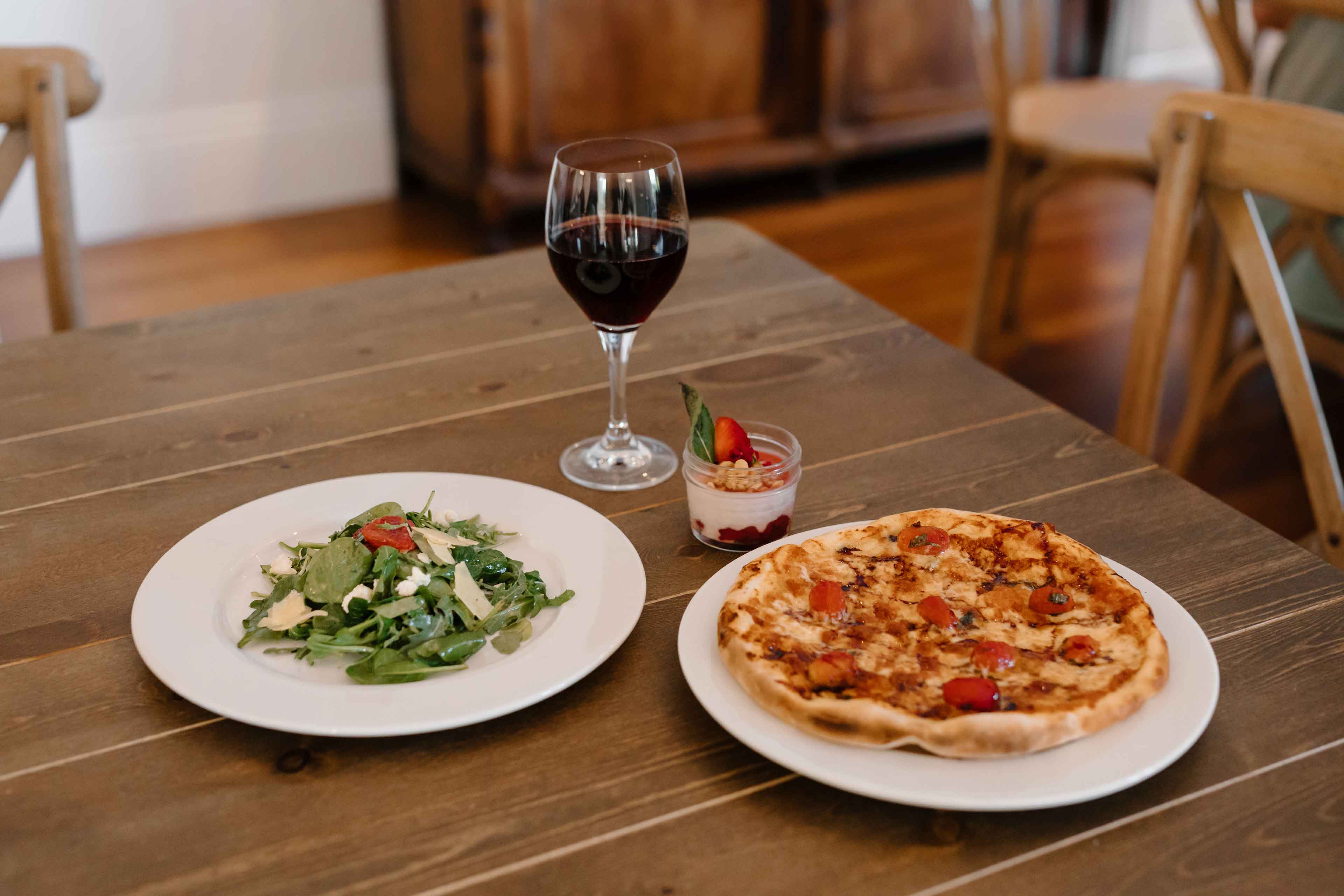 pizza wine salad and dessert full meal on pizza and pinot sonoma